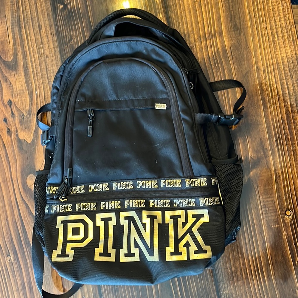 Victoria’s Secret PINK backpack, Black & Gold, Four pockets/laptop compartment.